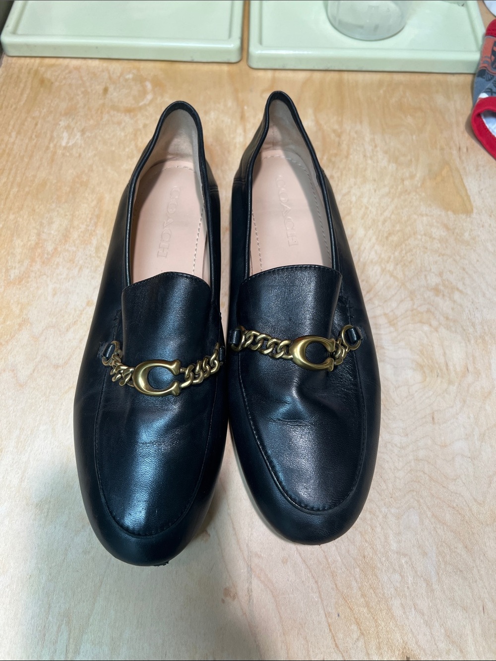 Coach Black Leather Loafers with Gold Chain Detail